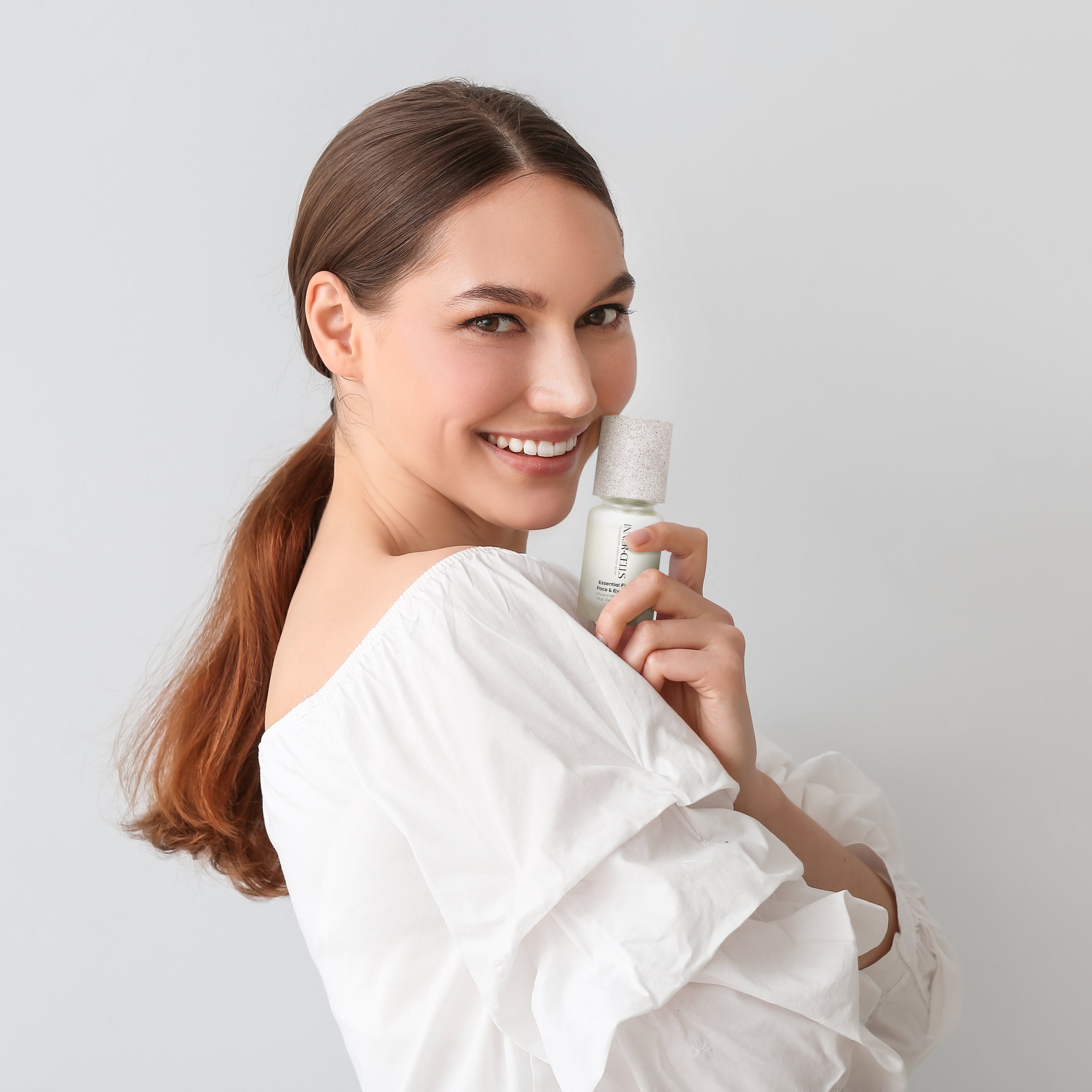 Essential Firming Face & Eye Cream Infused with Vitamin C + Multi-Peptide Complex